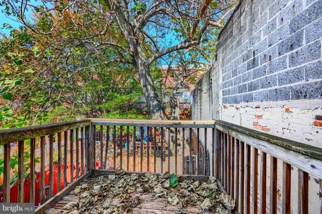 a view of a wooden fence