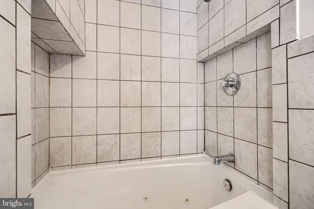 a bathroom with a bathtub