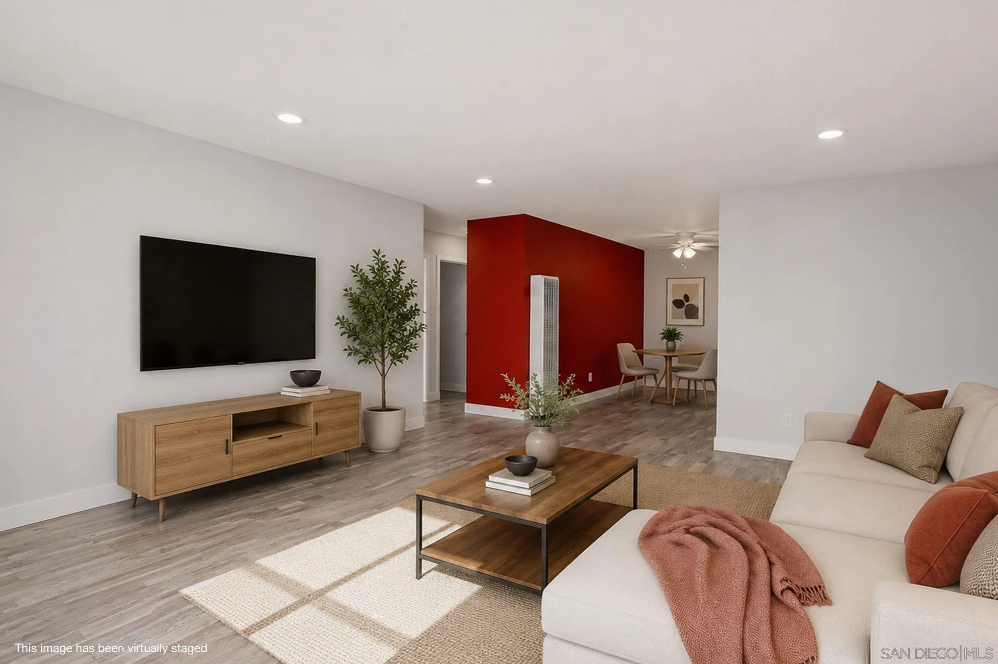293 Sycamore Road, Unit 15 San Ysidro, CA 92173 - Photo 3 of 25 a living room with furniture and a flat screen tv