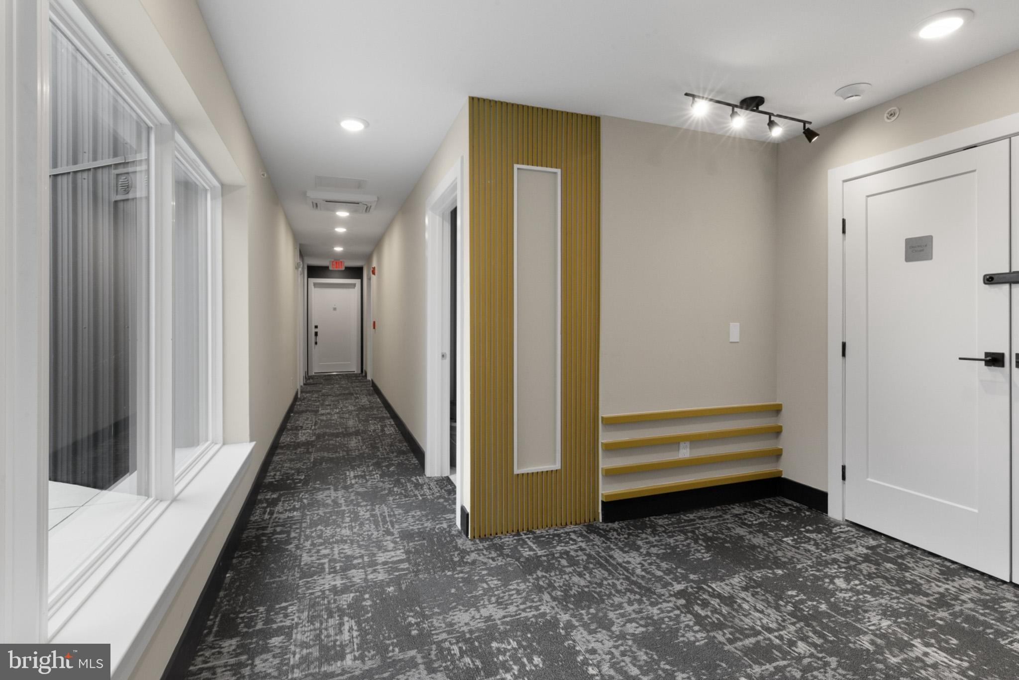 1924 North Front Street, Unit 305 Philadelphia, PA 19122 - Photo 24 of 30 a view of a hallway with a elevator