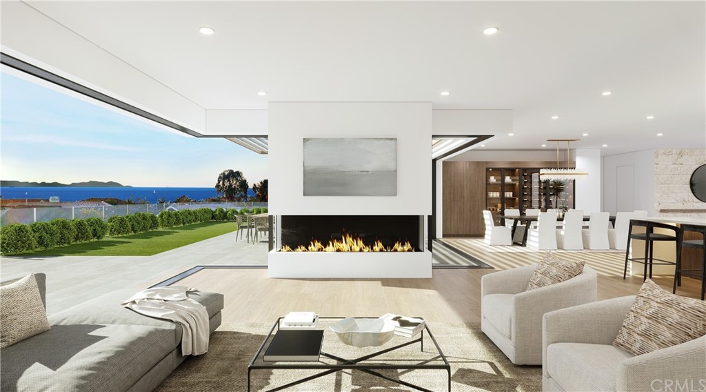 4601 Dorchester Road Corona del Mar, CA 92625 - Photo 1 of 22 a living room with furniture and a floor to ceiling window
