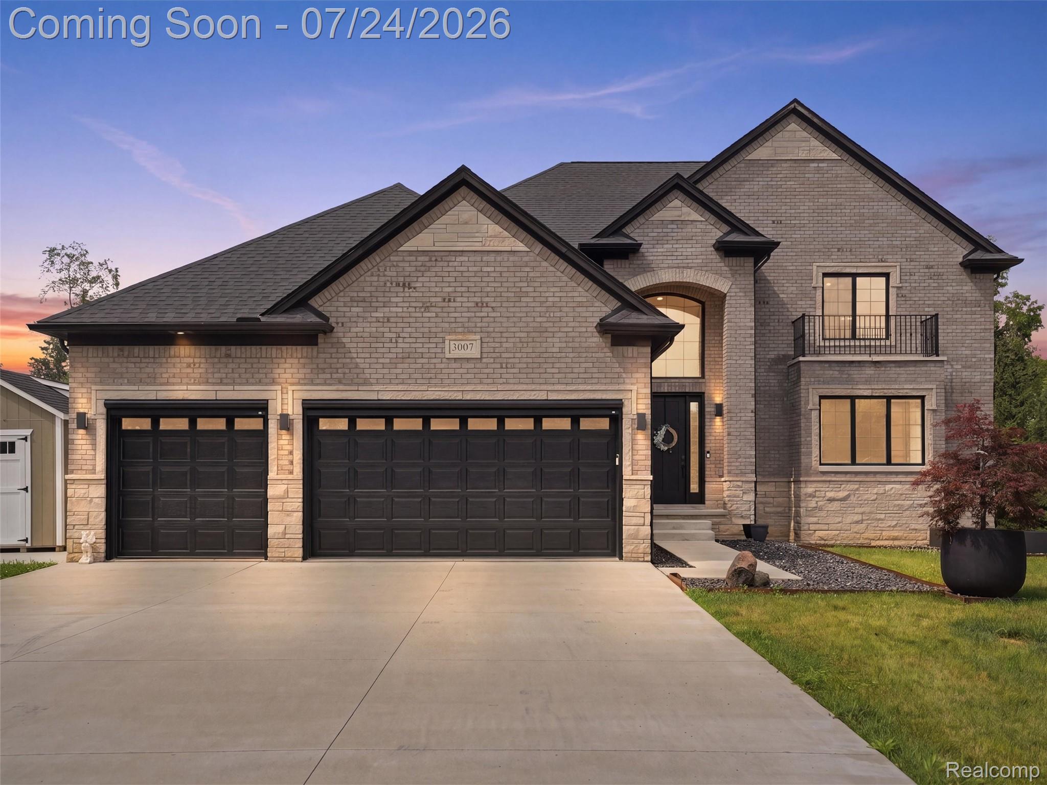 3007 28 Mile Road Washington, MI 48094 - Photo 1 of 69 Contemporary brick and stone facade featuring a prominent arched entry