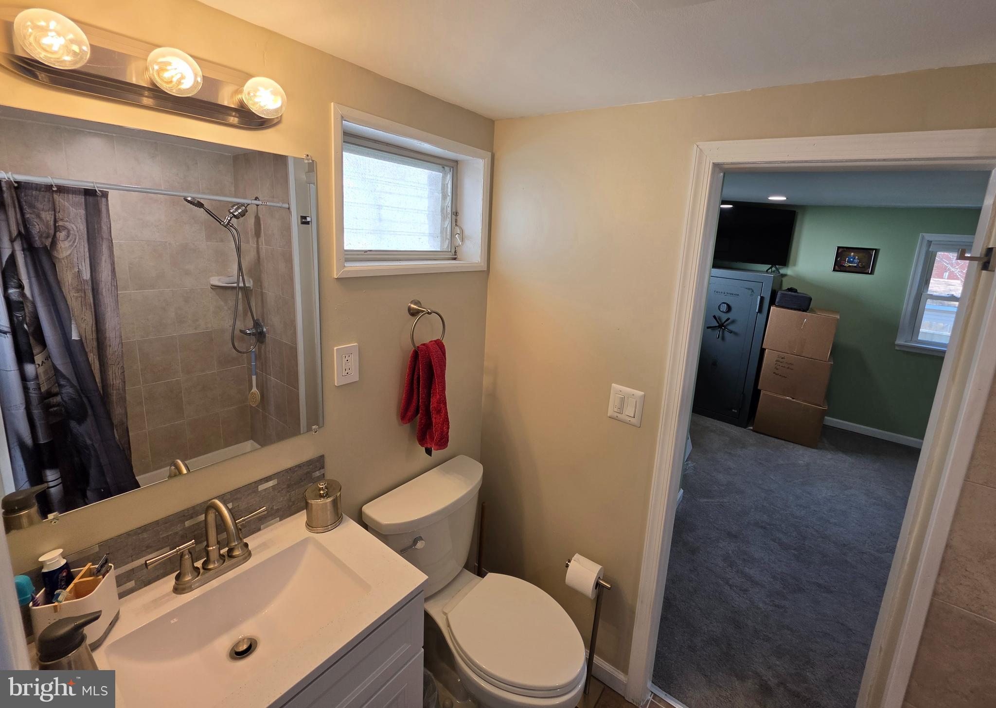 142 New Road Horsham, PA 19044 - Photo 24 of 38 a bathroom with a sink vanity mirror and toilet