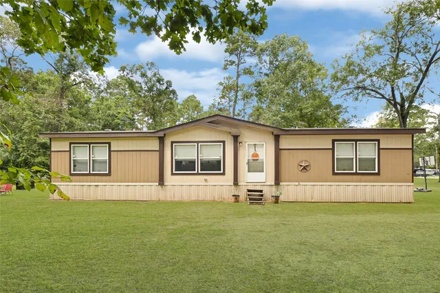 a front view of house with yard