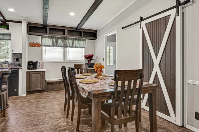 a view of a dining room with furniture