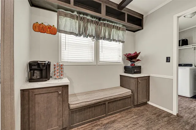 a kitchen with a stove and a microwave
