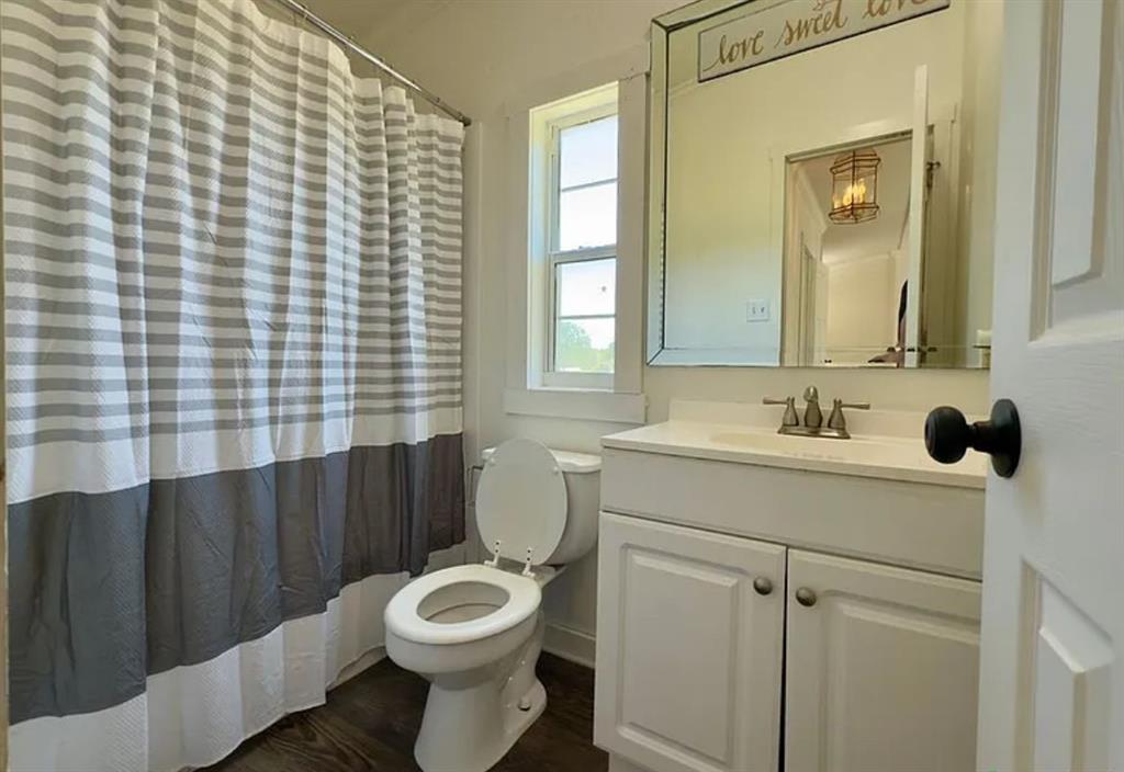 375 Alto Lane Gholson, TX 76705 - Photo 13 of 15 a bathroom with a sink toilet and mirror