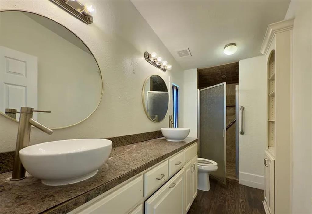 375 Alto Lane Gholson, TX 76705 - Photo 9 of 15 a bathroom with a toilet sink and mirror
