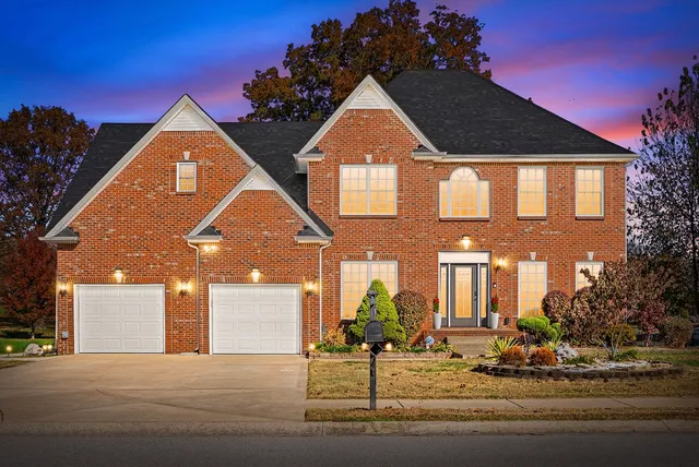 a front view of house with yard