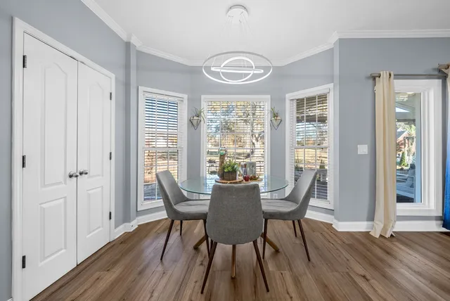 a living room with fireplace furniture and a window