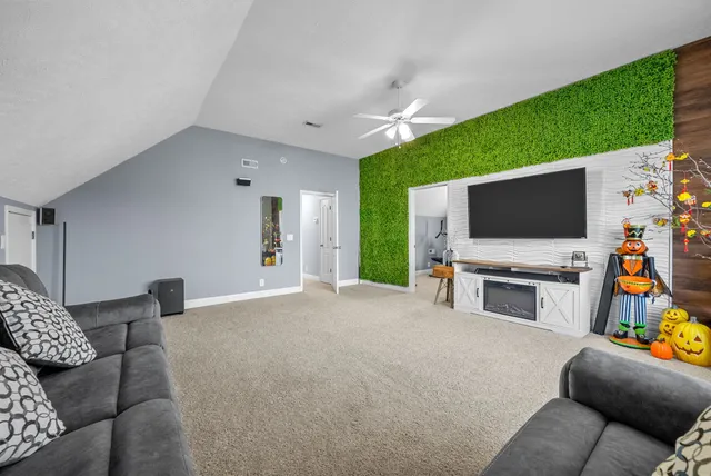 a view of a chairs and table on the wooden floor