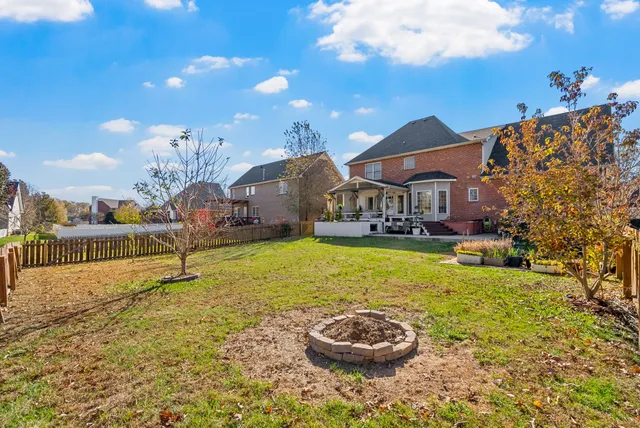 a aerial view of a house with swimming pool
