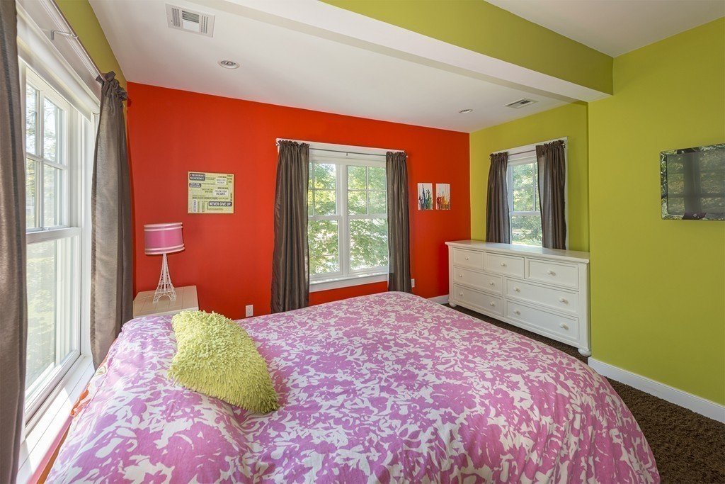 3 Turkey Shore Road Ipswich, MA 01938 - Photo 13 of 21 a bedroom with a bed and a dresser next to a window