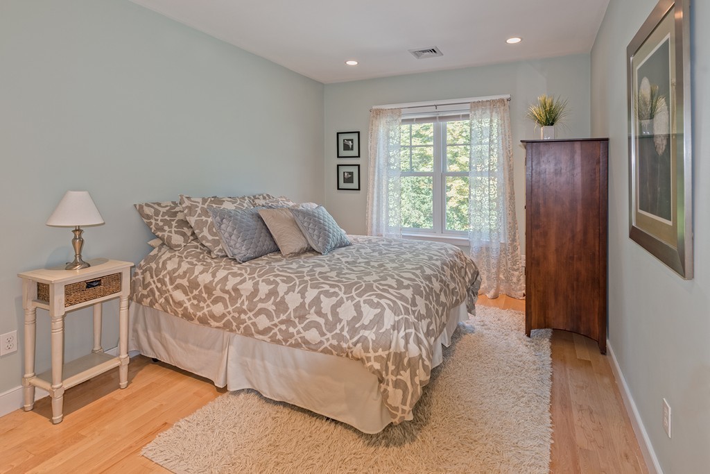 3 Turkey Shore Road Ipswich, MA 01938 - Photo 16 of 21 a bedroom with a large bed and a window
