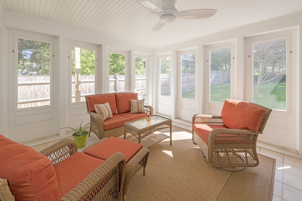 3 Turkey Shore Road Ipswich, MA 01938 - Photo 7 of 21 a living room with furniture and floor to ceiling windows