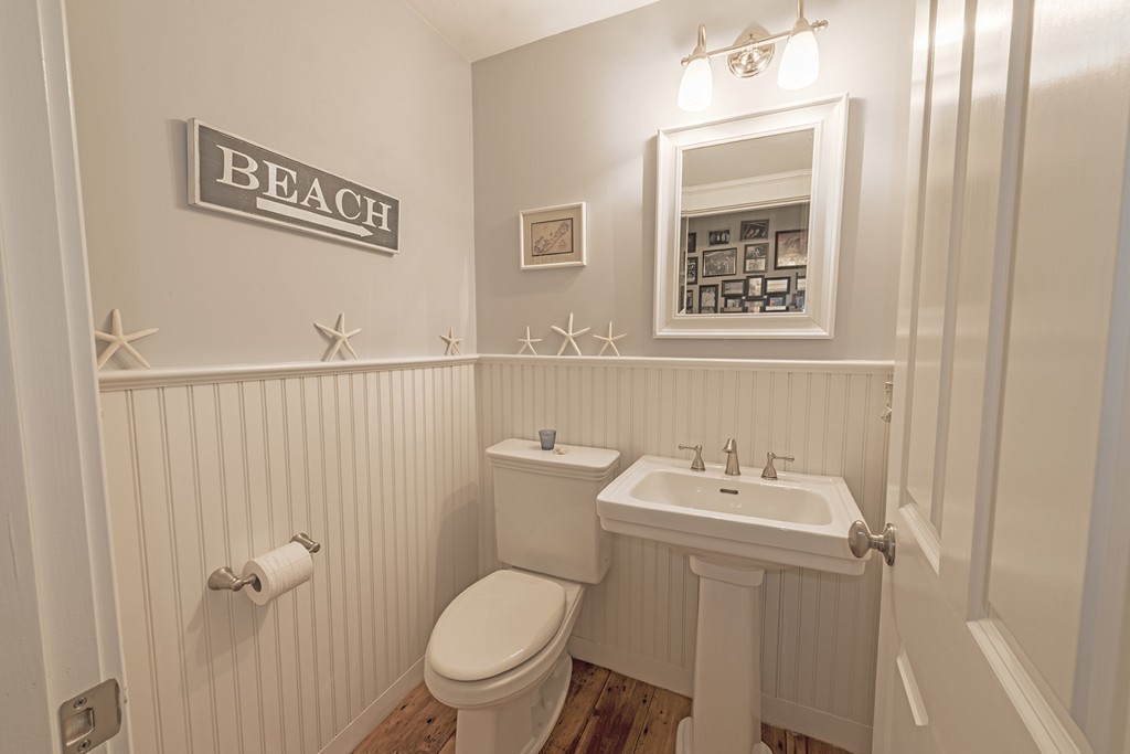 3 Turkey Shore Road Ipswich, MA 01938 - Photo 8 of 21 a bathroom with a toilet sink and mirror