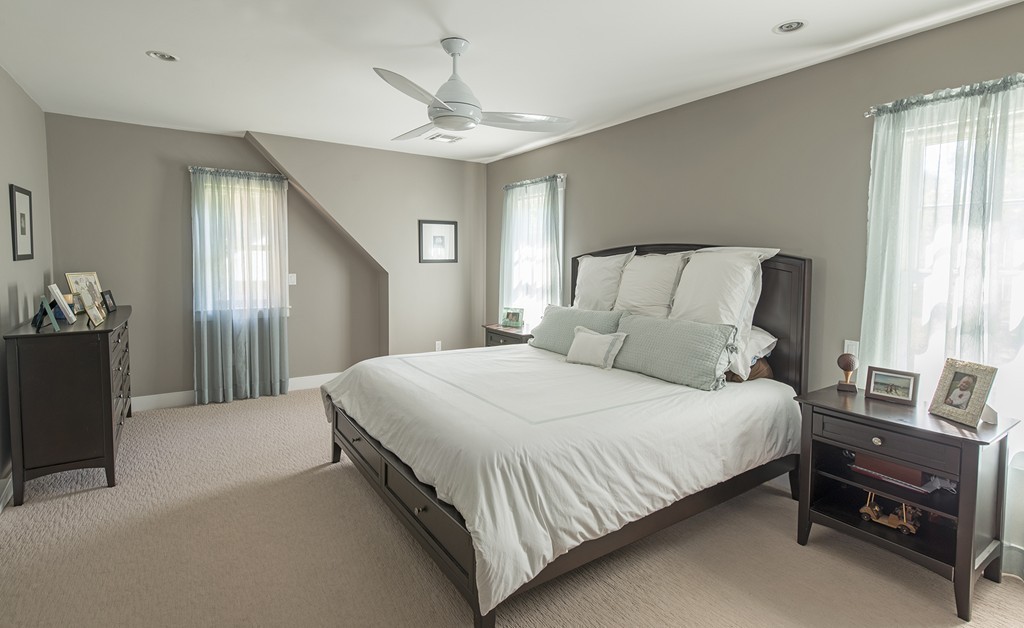 3 Turkey Shore Road Ipswich, MA 01938 - Photo 9 of 21 a bedroom with a bed and window