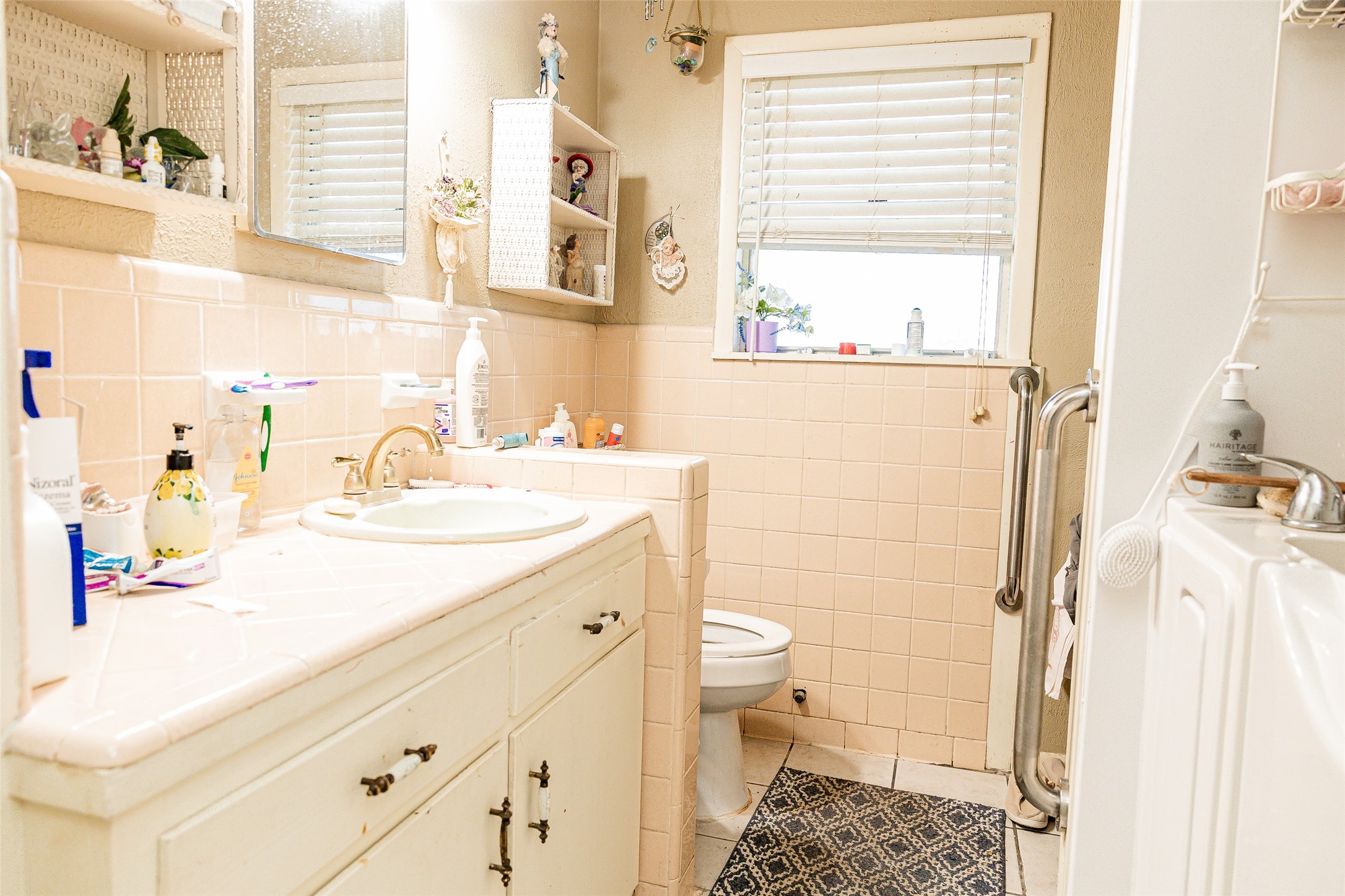 8608 Captain Scott Road Brenham, TX 77833 - Photo 15 of 28 a bathroom with a sink toilet and shower
