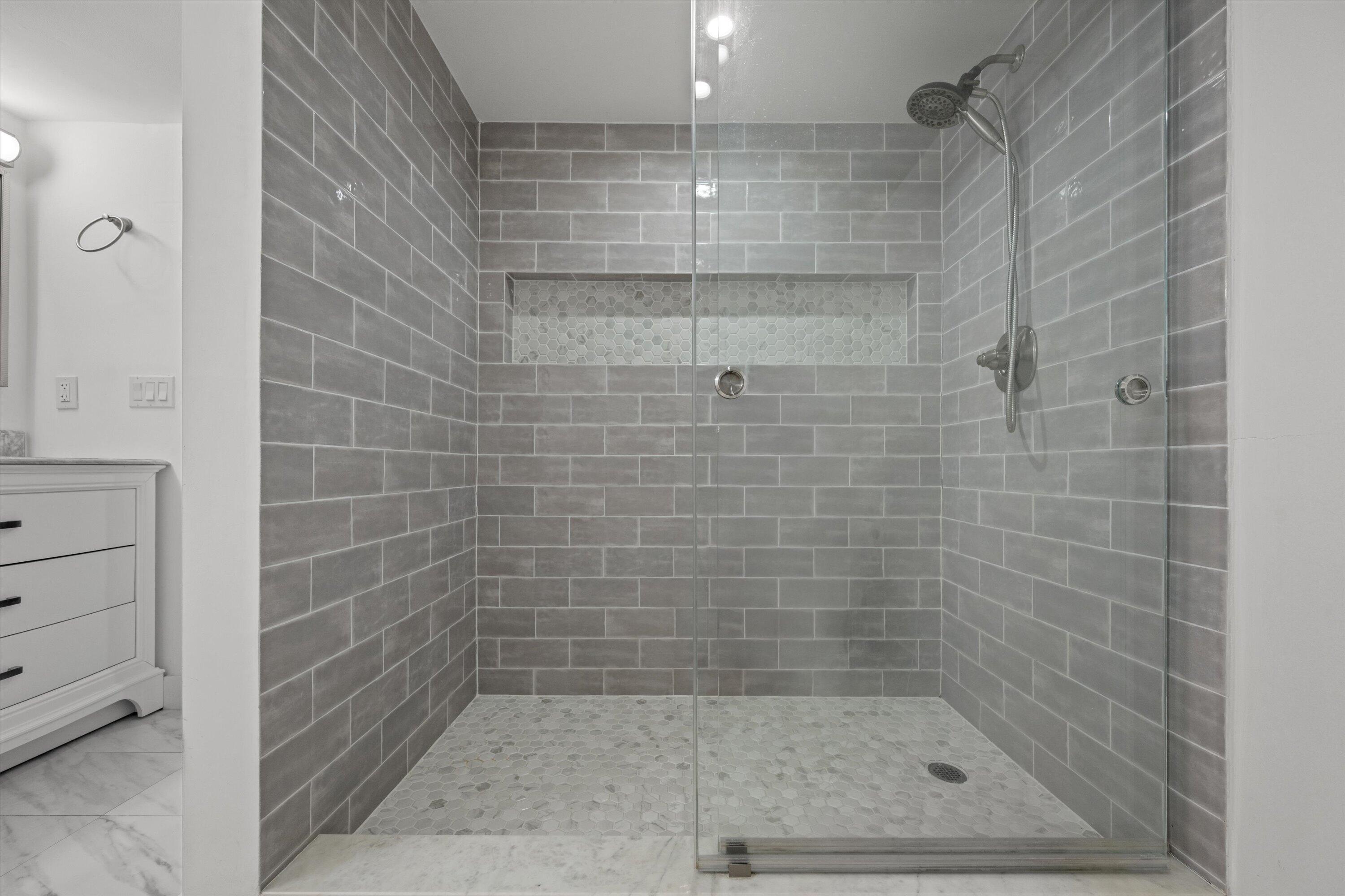 13400 Polo Road West, Unit 203 Wellington, FL 33414 - Photo 16 of 26 a bathroom with a shower