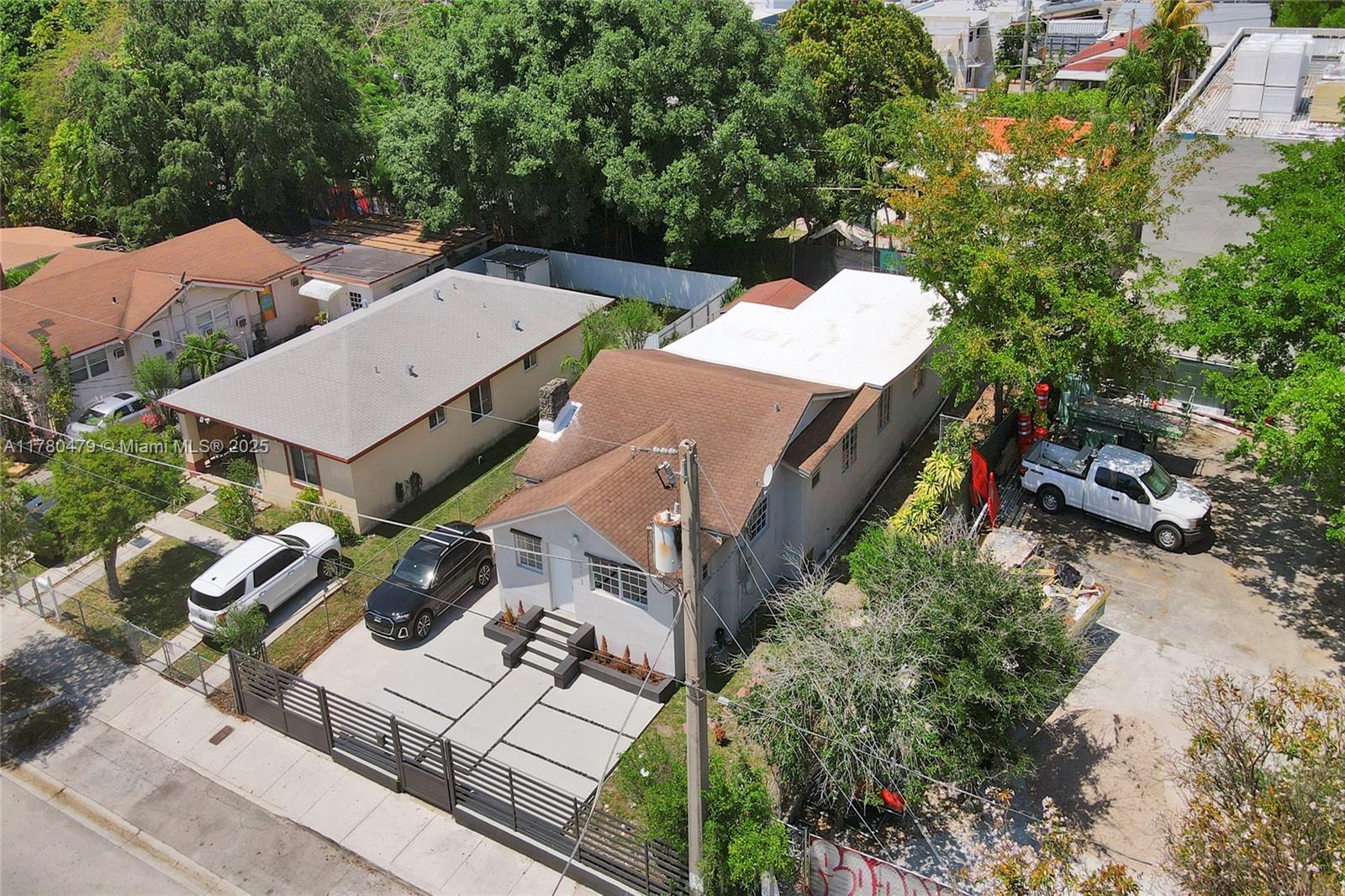 213 Northwest 34th Terrace Miami, FL 33127 - Photo 12 of 18 an aerial view of a house with a yard