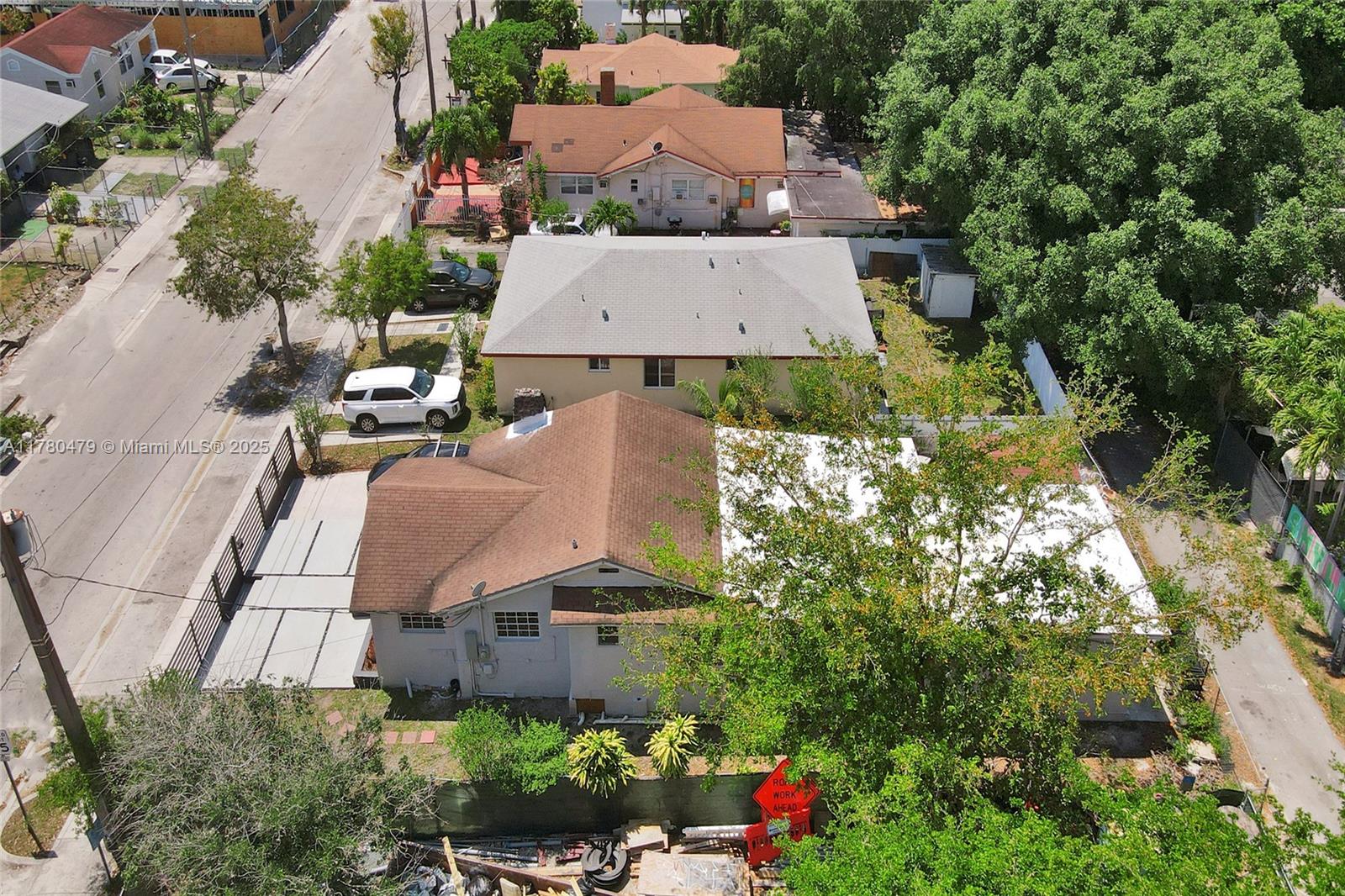 213 Northwest 34th Terrace Miami, FL 33127 - Photo 15 of 18 an aerial view of a house with a yard