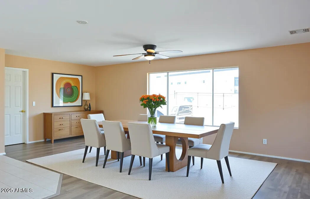 19348 West Brave Road Buckeye, AZ 85326 - Photo 10 of 22 Dining room virtual staging