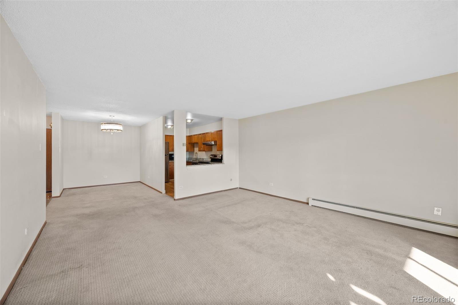 650 South Alton Way, Unit 3B Denver, CO 80247 - Photo 3 of 19 a view of an empty room