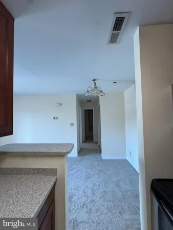 a view of a kitchen cabinets and a fireplace