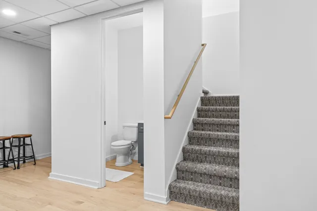 a view of a dinning table and chairs in patio of the house