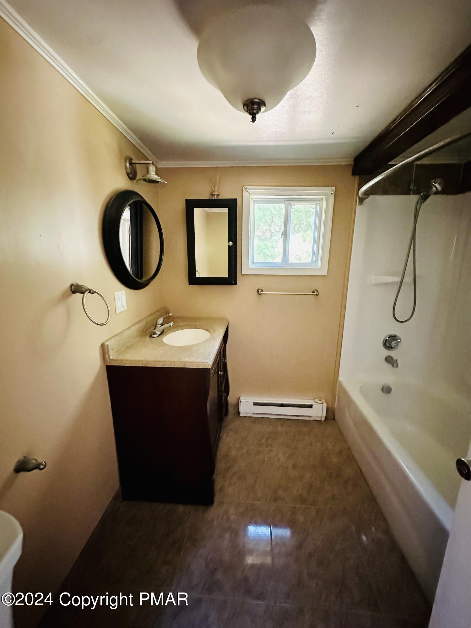 155 Sunrise Drive Milford, PA 18337 - Photo 11 of 16 a bathroom with a sink vanity granite tub and shower