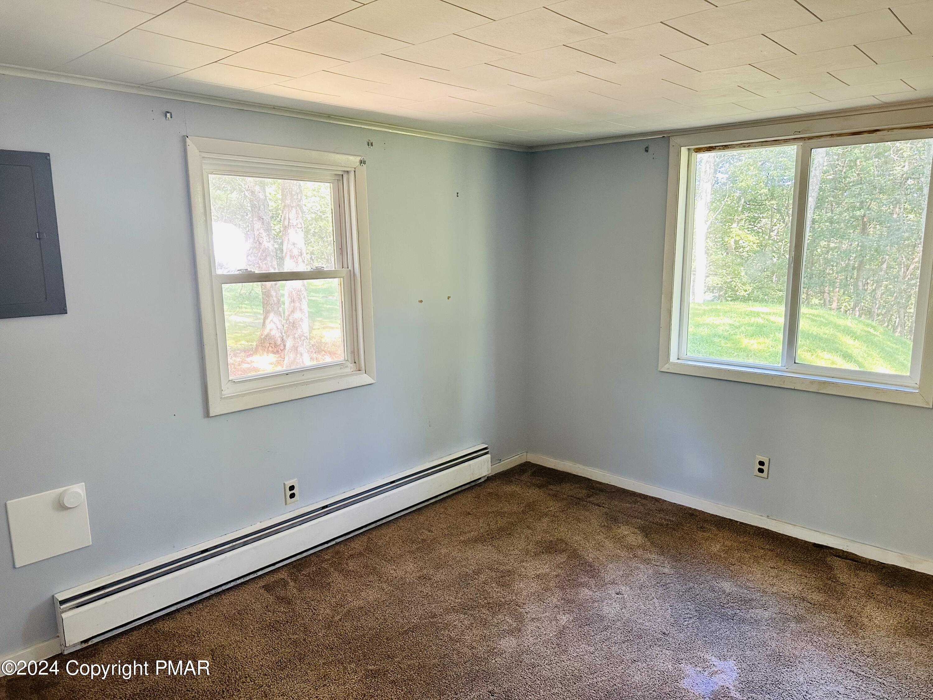 155 Sunrise Drive Milford, PA 18337 - Photo 13 of 16 an empty room with a window