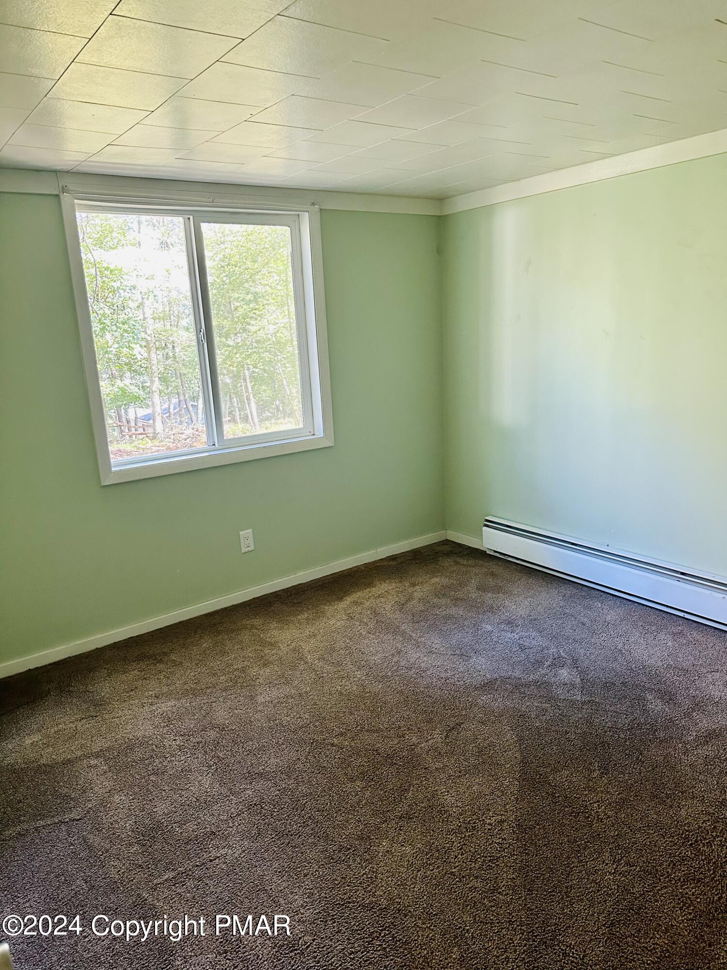 155 Sunrise Drive Milford, PA 18337 - Photo 14 of 16 an empty room with a window