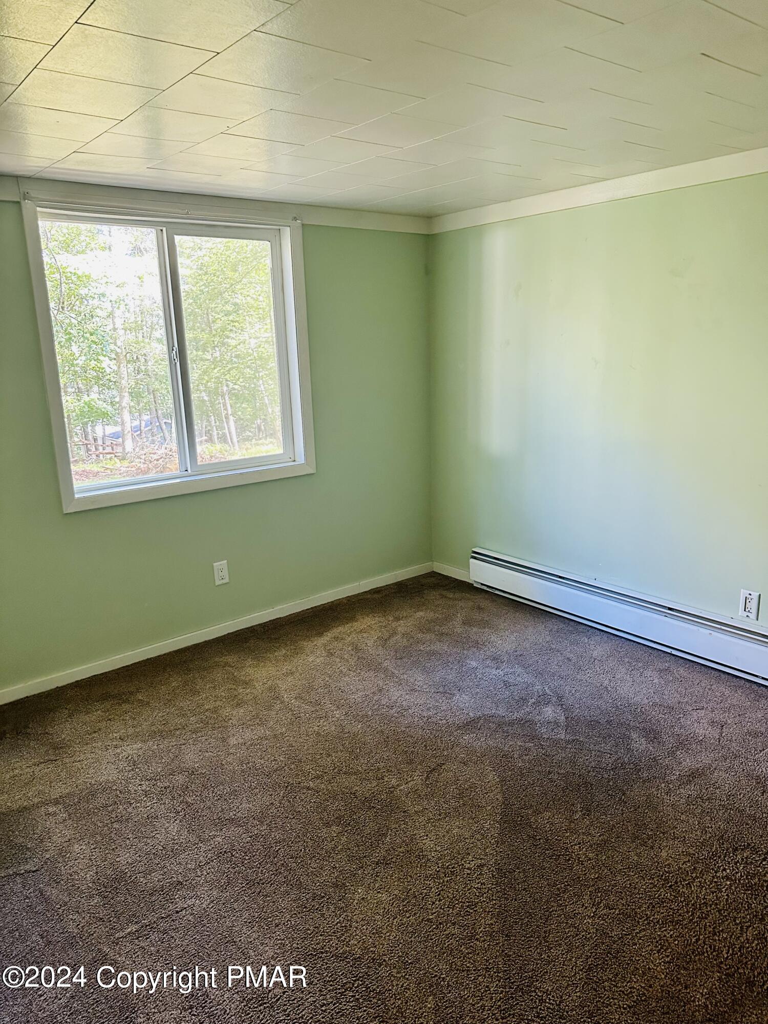 155 Sunrise Drive Milford, PA 18337 - Photo 10 of 16 a view of an empty room with a window