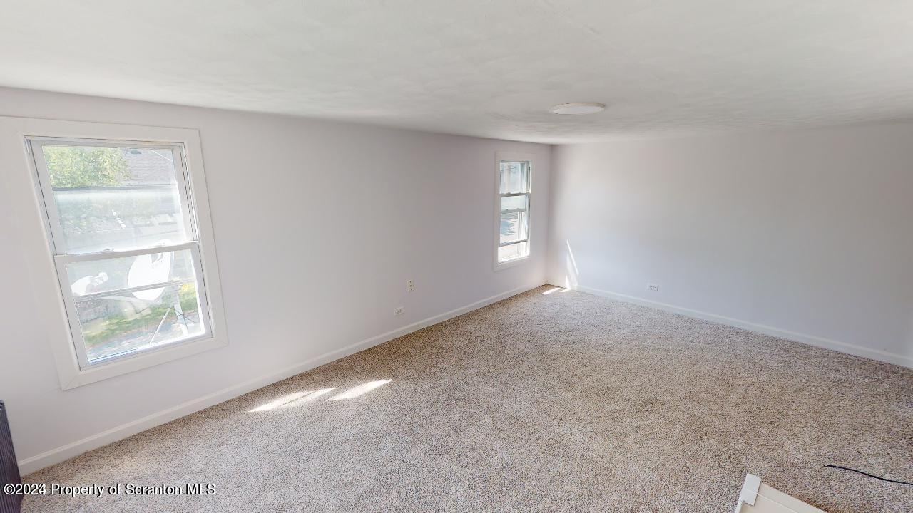 400 3rd Street Archbald, PA 18403 - Photo 11 of 15 a view of empty room with window