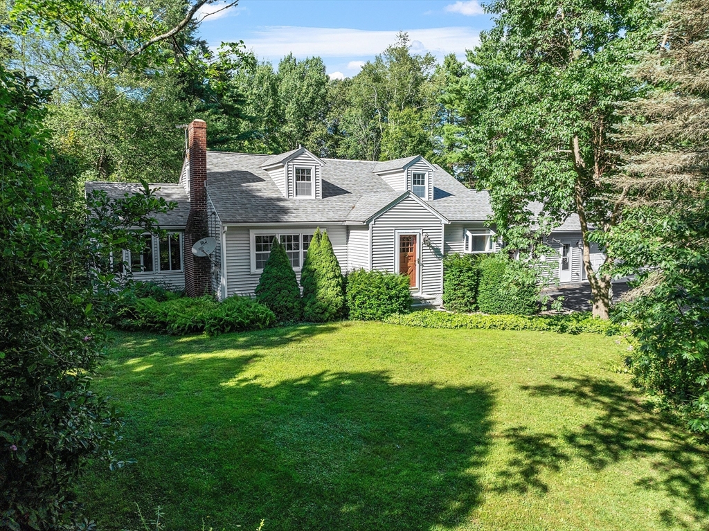 42 New Salem Road Petersham, MA 01366 - Photo 1 of 42 a front view of a house with a yard