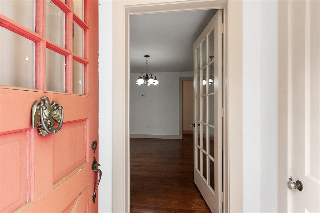 42 New Salem Road Petersham, MA 01366 - Photo 13 of 42 a view of a hallway with paintings on the wall