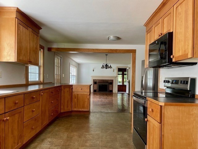 42 New Salem Road Petersham, MA 01366 - Photo 20 of 42 a kitchen with stainless steel appliances granite countertop a refrigerator and a stove top oven