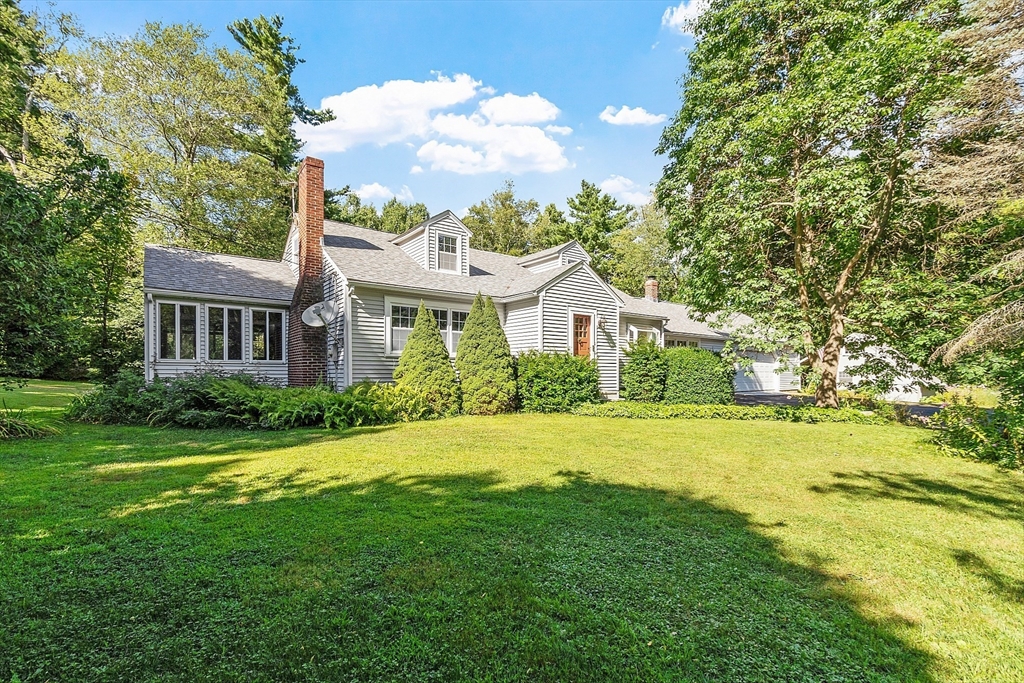 42 New Salem Road Petersham, MA 01366 - Photo 2 of 42 a front view of a house with a yard