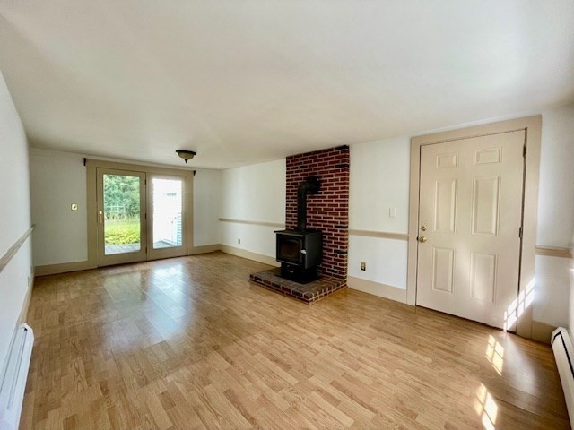 42 New Salem Road Petersham, MA 01366 - Photo 24 of 42 a view of empty room with wooden floor and fan