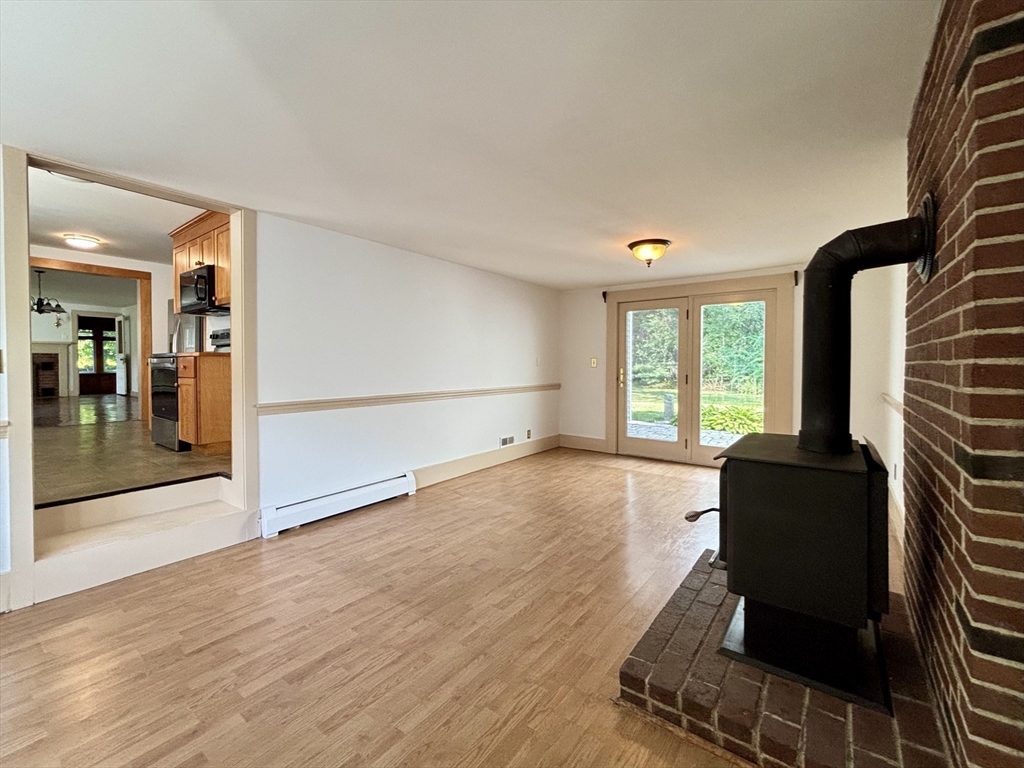 42 New Salem Road Petersham, MA 01366 - Photo 25 of 42 wooden floor in an empty room with a window