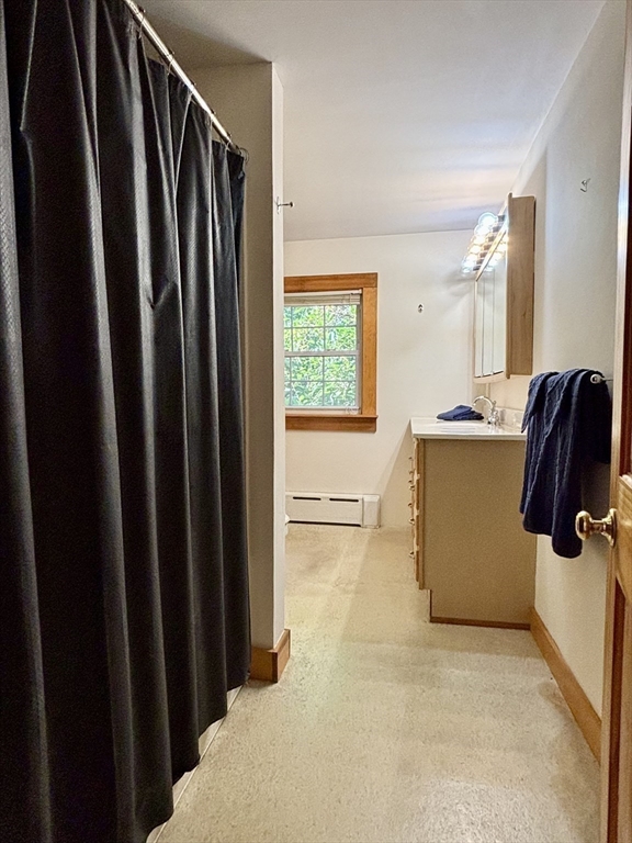 42 New Salem Road Petersham, MA 01366 - Photo 32 of 42 a view of walk in closet with clothes and shoes