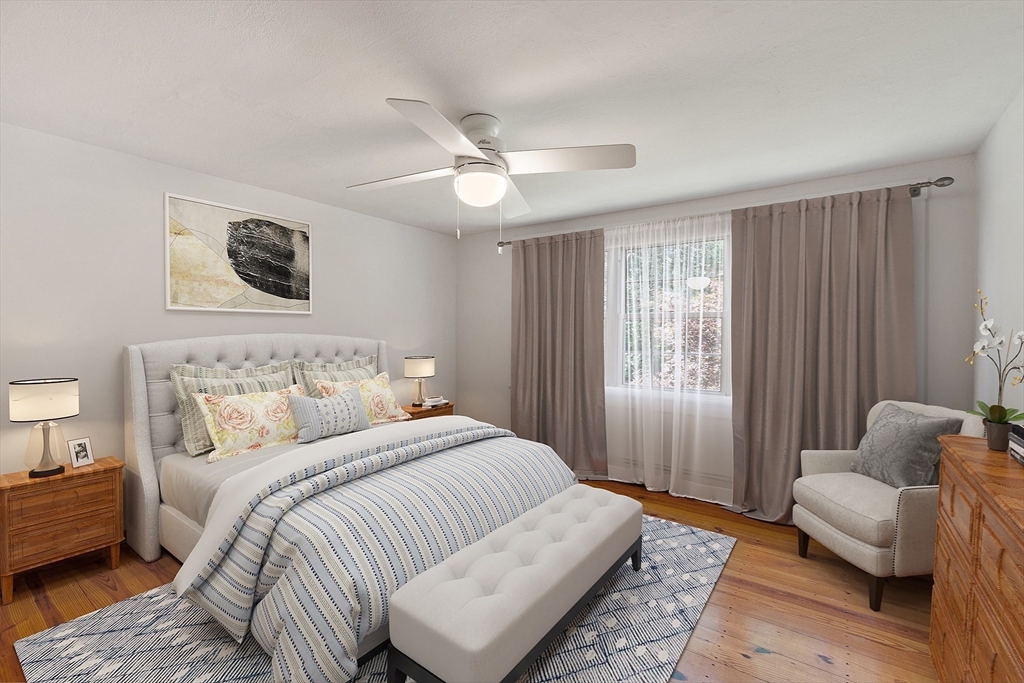 42 New Salem Road Petersham, MA 01366 - Photo 33 of 42 a bedroom with a bed and wooden floor