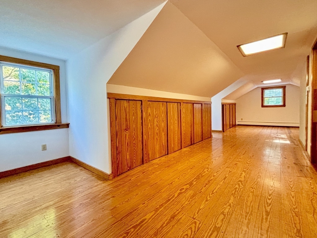 42 New Salem Road Petersham, MA 01366 - Photo 39 of 42 a view of an empty room with wooden floor and a window