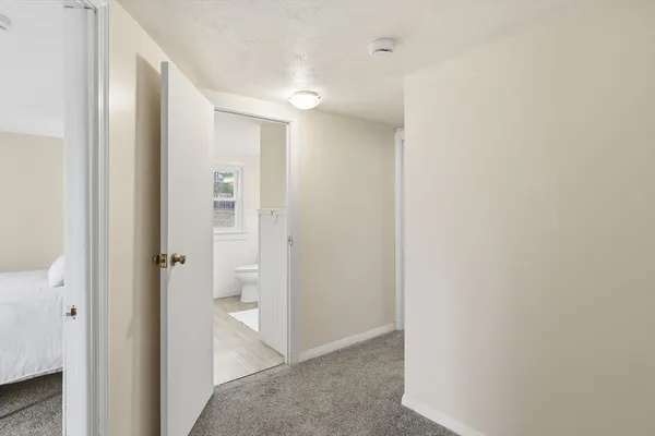 a view of a bathroom with toilet