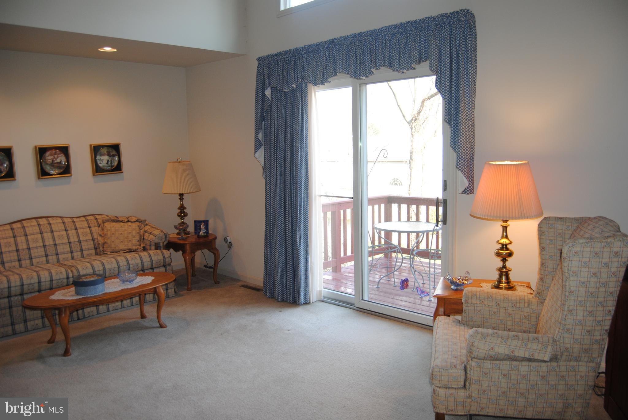 1932 Deer Path Road Harrisburg, PA 17110 - Photo 5 of 28 Sliders to deck from living room