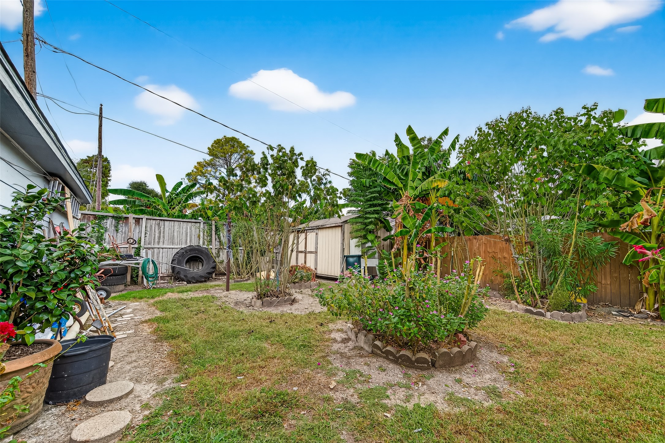 8222 La Roche Lane Houston, TX 77036 - Photo 28 of 32 a backyard of a house with seating space