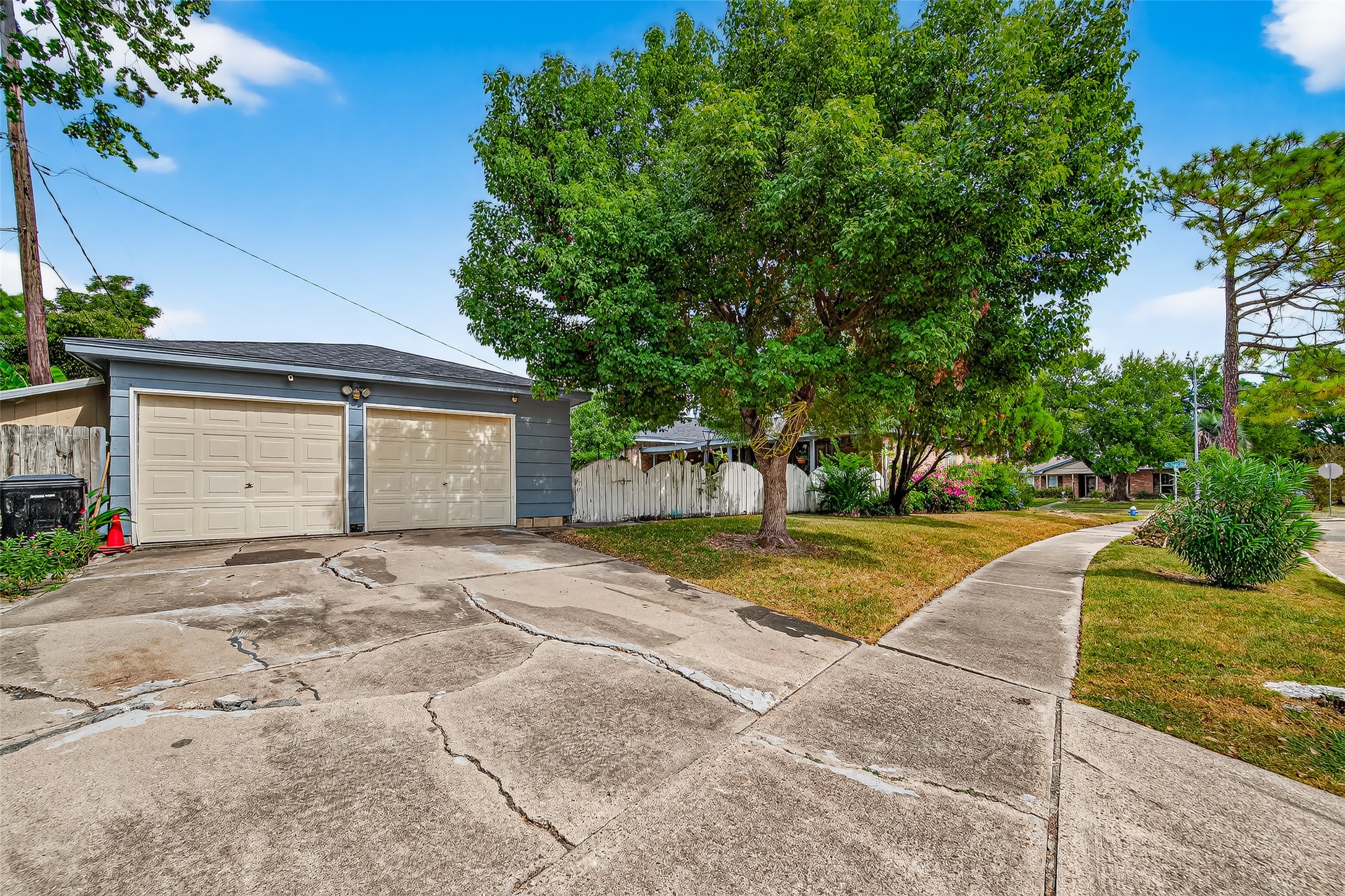 8222 La Roche Lane Houston, TX 77036 - Photo 32 of 32 a front view of a house with a yard and garage