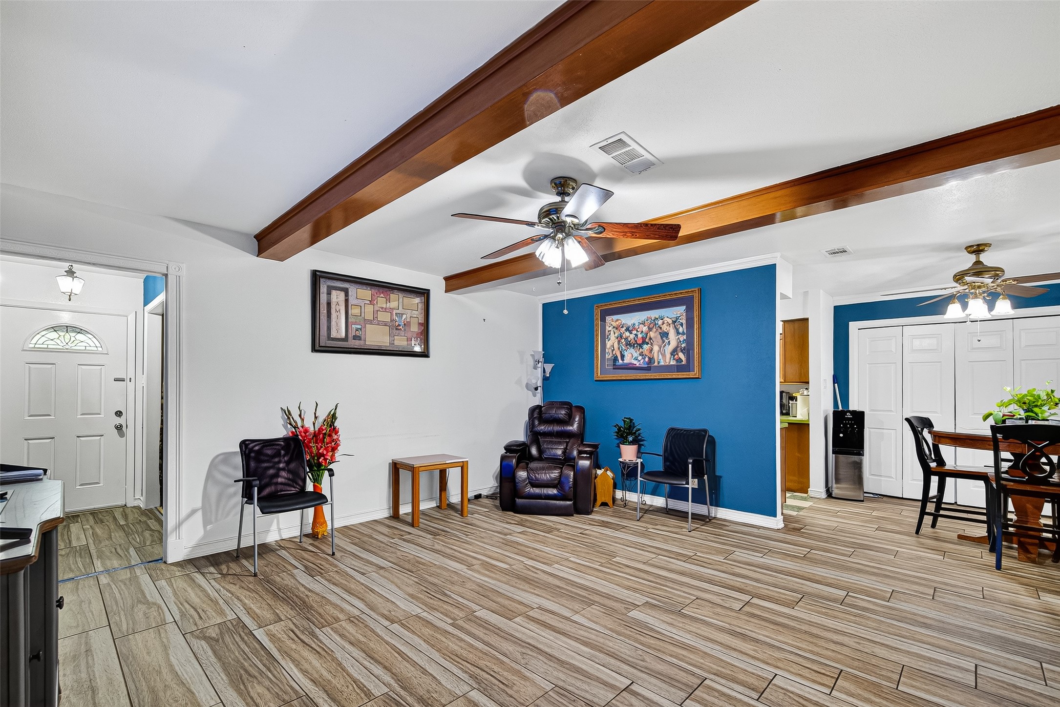 8222 La Roche Lane Houston, TX 77036 - Photo 4 of 32 a bedroom with furniture and a wooden floor
