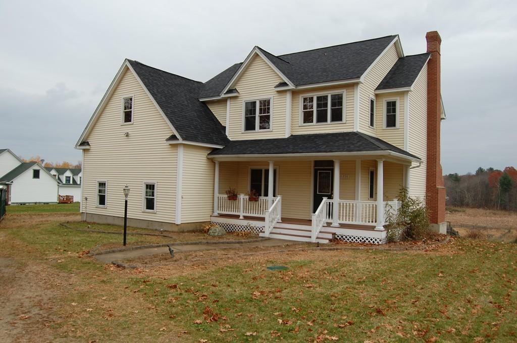 236 Hardwick Road New Braintree, MA 01531 - Photo 1 of 28 a front view of a house with garden