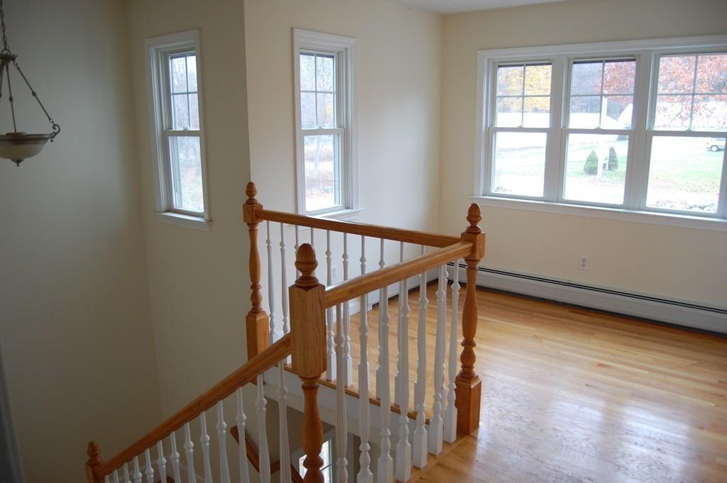 236 Hardwick Road New Braintree, MA 01531 - Photo 12 of 28 a view of staircase with railing and a window